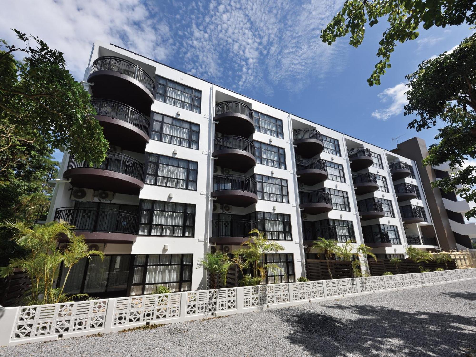 Karry Condo Churaumi Мотобу Екстериор снимка